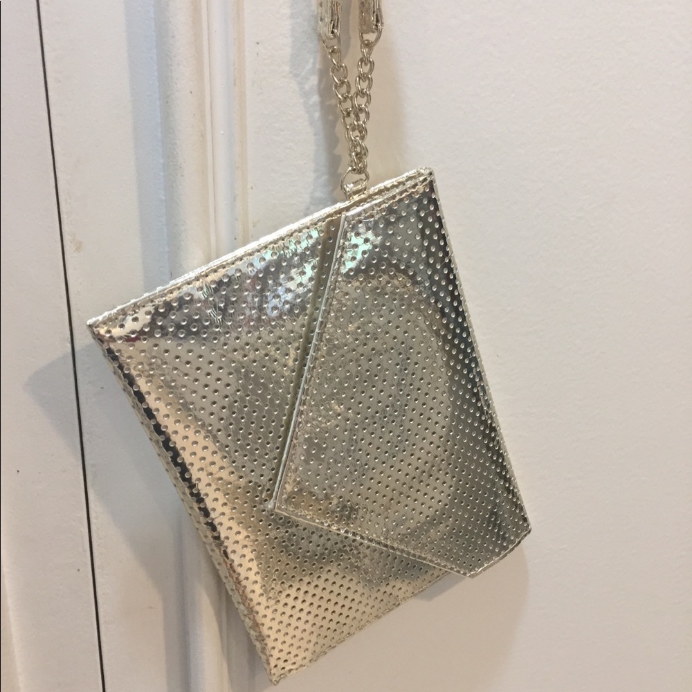 NWOT Estée Lauder gold clutch